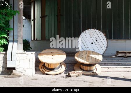 Large empty cable reels. nailed wood and plywood reels are used for a wide range of wire and cable applications Stock Photo