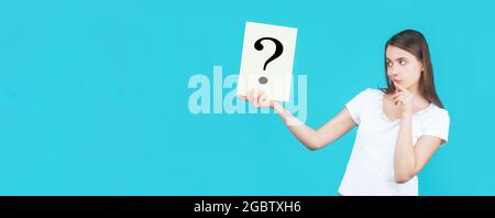 Thinking woman. Getting answers, thinking. Question mark, symbol. Concept - challenging issue, looking for the answer Stock Photo