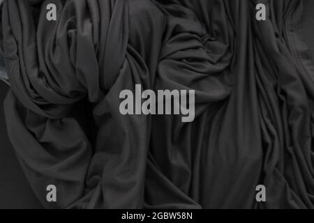 A Bunched Dark Gray Sheet Stock Photo