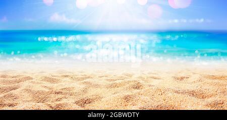 Beach - Sand With Abstract And Defocused Ocean In Background Stock Photo