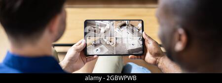 CCTV Security Camera Surveillance Footage On Tablet Stock Photo