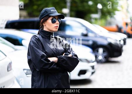 Car Parking Security Guard Officer Standing In Uniform Stock Photo