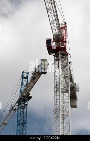Two construction cranes at construction site. Ontario Canada Stock Photo