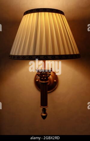 beautiful candlestick hanging on the wall close-up Stock Photo