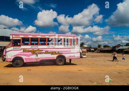 IQUITOS, PERU - JULY 19, 2015: Wooden bus stays on a bus terminal in Iquitos, Peru Stock Photo