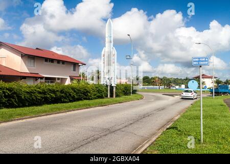 KOUROU, FRENCH GUIANA - AUGUST 3, 2015: Model of space rocket Ariane 5 on a street in Kourou, French Guiana. Stock Photo