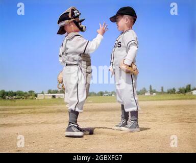 A teenage boy's little league baseball team portrait in the 1940's Stock  Photo - Alamy