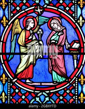 Nativity Window, stained glass, by Oudinot of Paris, 1861, Feltwell Church, Norfolk. Annunciation by Archangel Gabriel, to Virgin Mary, Stock Photo