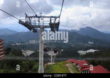 GENTING HIGHLAND, MALAYSIA - November 22, 2019: Awana Skyway cable car, one of Genting Highland's most popular attractions, providing a method of Stock Photo
