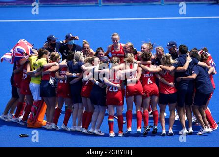 Great Britain players and staff celebrate winning bronze in the Women's Bronze Medal Match at the Oi Hockey Stadium on the fourteenth day of the Tokyo 2020 Olympic Games in Japan. Picture date: Friday August 6, 2021. Stock Photo