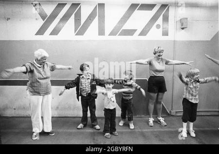 Austin Texas USA, circa 1986: YMCA exercise program for seniors and children. ©Bob Daemmrich Stock Photo