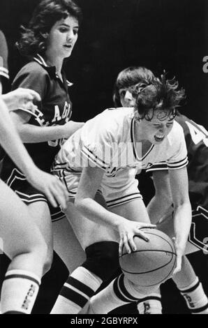 Austin Texas USA, circa 1986: Basketball players fight for the ball during the girls high school state basketball tournament finals. ©Bob Daemmrich Stock Photo