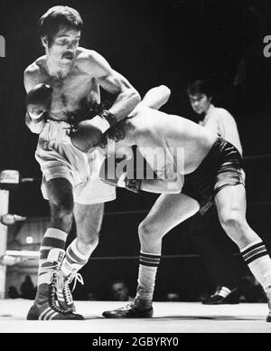 Austin, Texas USA, circa 1984: Boxers competing in ring. Austin gym owner Richard Lord is on the left. ©Bob Daemmrich Stock Photo