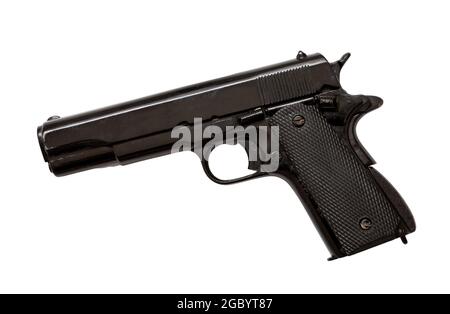 Pistol gun 9mm isolated cutout on white background. Black metal weapon, automatic handgun for defense and protection. Side view Stock Photo