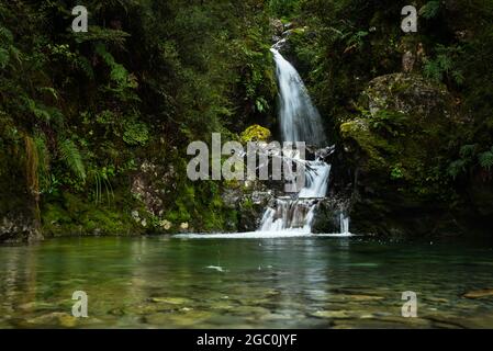 Avalanche Creek Waterfall in the rain, Arthur’s Pass, South Island of New Zealand Stock Photo