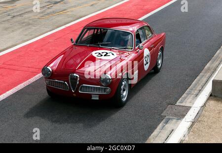 Hans Joerg Haussener's, Alfa Romeo Giulietta Sprint Veloce in the pit lane before the start of the International Trophy For Classic Pre-66 GT Cars Stock Photo