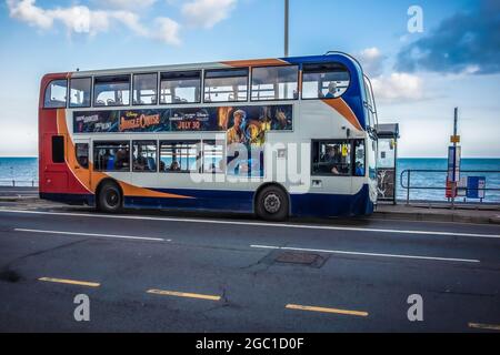 Bus waiting for passengers to board, Hastings East Sussex Stock Photo