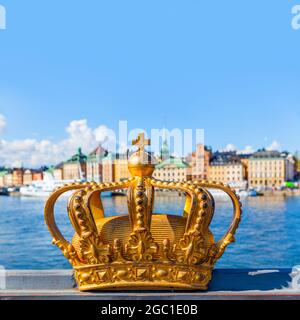Golden crown on Skeppsholm bridge in Stockholm , Sweden Stock Photo