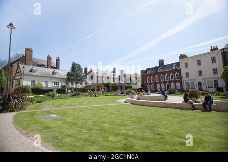 Views of Gloucester Cathedral Gardens and surrounding buildings in Gloucester in the UK Stock Photo