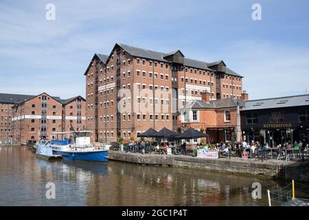 People drinking at the Wetherspoon pub at Gloucester Quays in the UK Stock Photo