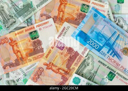 Banknotes in Russian Rubles. The ruble is the currency of Russia.Russian money in denominations of 1000,2000 and 5000 rubles Stock Photo