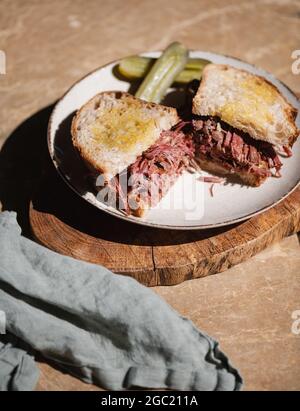 Homemade Pulled beef Reuben sandwich with sourdough bread Stock Photo