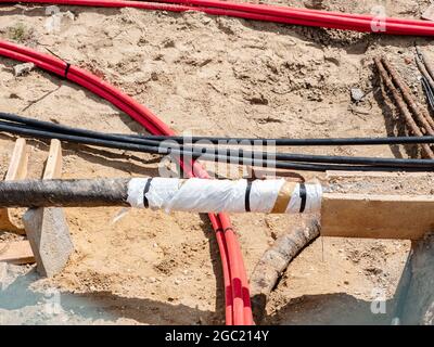 Replacement of city underground conduction of high voltage lines in pipes system Stock Photo