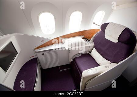 First class seat pods in a 787 Dreamliner Stock Photo