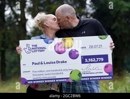 Paul and Louise Drake celebrating their £5.16 million pound lottery win at Deer Park Golf and Country Club in Livingston, West Lothian. Paul and Louise, a district nurse, live with their two sons, aged 11 and 15, in Seafield near Bathgate, Edinburgh. Picture date: Friday August 6, 2021. Stock Photo