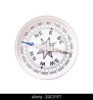 Tourist compass on a white background. Compass on white background. Stock Photo