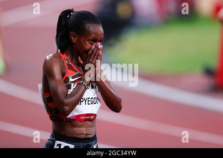 Tokyo, Japan. 6th Aug, 2021. Faith Kipyegon of Team Kenya celebrates during the Women's 1500m Final on Day 14 of the Tokyo 2020 Olympic Games. Credit: Pete Dovgan/Speed Media/Alamy Live News Stock Photo