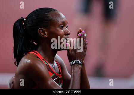 Tokyo, Japan. 6th Aug, 2021. Faith Kipyegon of Team Kenya celebrates during the Women's 1500m Final on Day 14 of the Tokyo 2020 Olympic Games. Credit: Pete Dovgan/Speed Media/Alamy Live News Stock Photo