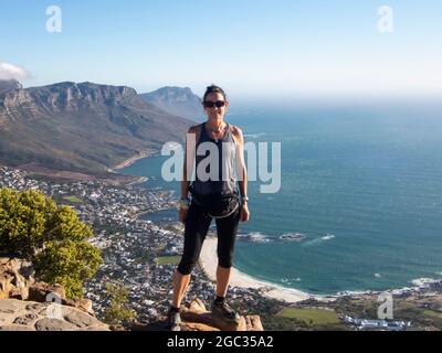 Hiker on  Lion's Head peak, Cape Town, South Africa Stock Photo