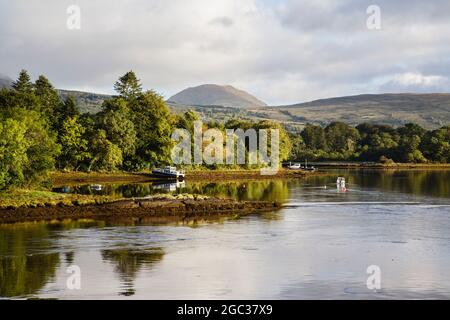View up tidal Kenmare River from N71 road bridge in early morning light. Kenmare County Kerry Eire Ireland Stock Photo