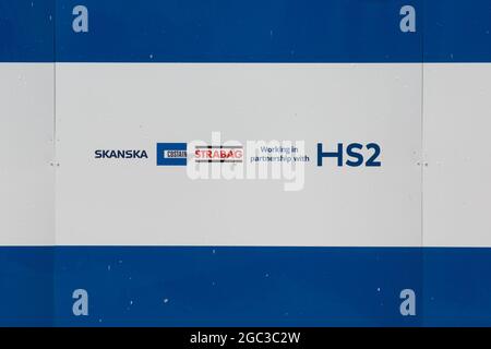 London, UK. 6th August, 2021. SCS signage on boarding around the Euston construction site for the HS2 high-speed rail link. SCS is a HS2 joint venture contractor formed by Skanska, Costain and Strabag. Credit: Mark Kerrison/Alamy Live News Stock Photo