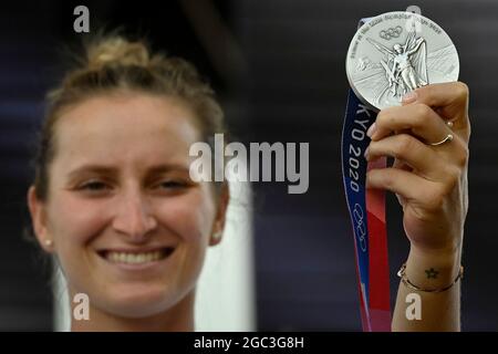 Prague, Czech Republic. 06th Aug, 2021. Czech tennis player Marketa Vondrousova shows her silver medal from the Tokyo 2020 Summer Olympics, on August 6, 2021, at The Olympic festival Tokyo 2020 in Prague, Czech Republic. Credit: Vit Simanek/CTK Photo/Alamy Live News Stock Photo