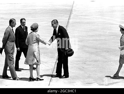 Santiago, Chile: Britian's Queen Elizabeth II, is welcomed by the President of Chile, Eduardo Frei (right), as she and the Duke of Edinburgh (left), arrived at Santiago Airport on November 11th, for the start of their state visit to Chile. 13 November 1968 Stock Photo
