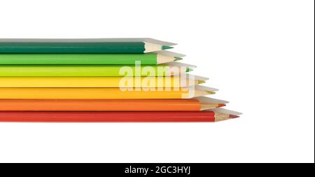 Creative Energy efficiency rating chart concept. Colorful colored pencils on white background Stock Photo