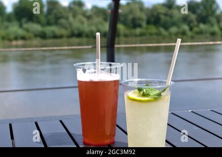 Lemonade soft drinks at the river Stock Photo