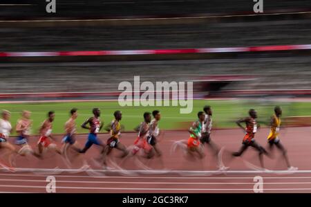 Tokyo, Kanto, Japan. 6th Aug, 2021. Runners compete in the Men's 5000m compete during the Tokyo 2020 Olympics at the Tokyo Olympic Stadium on Friday, August 6, 2021 in Tokyo. (Credit Image: © Paul Kitagaki Jr./ZUMA Press Wire) Stock Photo