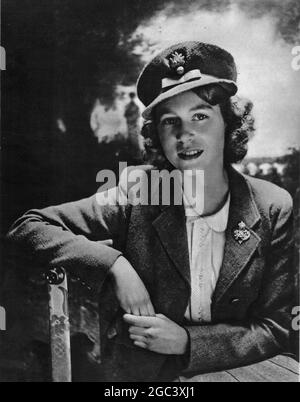 SATURDAY, 26 DECEMBER 1942. THE HEIR-PRESUMPTIVE TO THE THRONE: H.R.H. PRINCESS ELIZABETH. This interesting new portrait of Princess Elizabeth, made in the Bow Room at Buckingham Palace, shows her Royal Highness wearing the insignia of the Grenadier Guards. Princess Elizabeth is in her seventeenth year, having been born on April 21, 1926. It was on her sixteenth birthday that His Majesty the King conferred on her the title of Honorary Colonel of the famous Grenadier Guards, and a parade was held in her honour at Windsor. Stock Photo