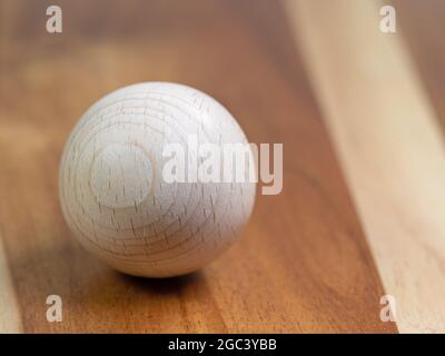 Wooden ball in a close-up Stock Photo