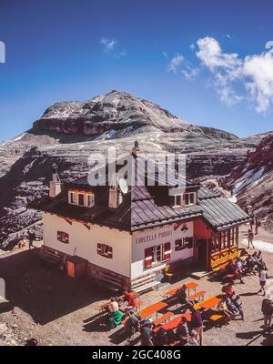 This is the privately owned Rifugio Forcella al Pordoi located on the edge of the Sella massif-Piz Boe plateau not far from at the head of the Passo Pordoi cable car looking towards Piz Boe 3152m mountain, the highest mountain in the Sella Group. The area around the refuge-hut was included as part of the film set for Sylvester Stallone's movie cliffhanger Stock Photo