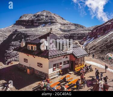 This is the privately owned Rifugio Forcella al Pordoi located on the edge of the Sella massif-Piz Boe plateau not far from at the head of the Passo Pordoi cable car looking towards Piz Boe 3152m mountain, the highest mountain in the Sella Group. The area around the refuge-hut was included as part of the film set for Sylvester Stallone's movie cliffhanger Stock Photo