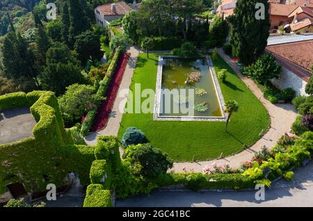DUINO, Italy - June 5, 2021: Panoramic view on the park of the castle of Duino near Trieste Stock Photo