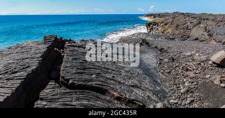 Sea Cliffs Formed by Recent Lava Flows on Kaimu Black Sand Beach, Hawaii Island, Hawaii, USA Stock Photo