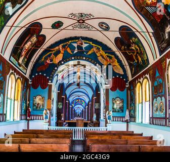 Altar and Interior of The Star of The Sea Painted  Church (1927-28), Kalapana, Hawaii Island, Hawaii, USA Stock Photo