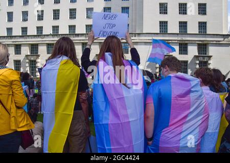 London, United Kingdom. 6th Aug, 2021. Protesters gathered outside Downing Street demanding an end to discrimination against the trans community, better support from the government against hate, and improvements to trans healthcare waiting times. Stock Photo