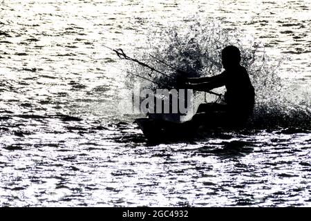 Kitesurfer in a sea near village Cabo de la Vela located on La Guajira peninsula, Colombia Stock Photo