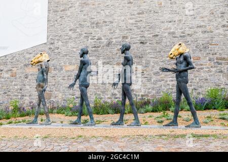 July, 2021, Erfurt Germany. New sculptures in golden horse masks Stock Photo